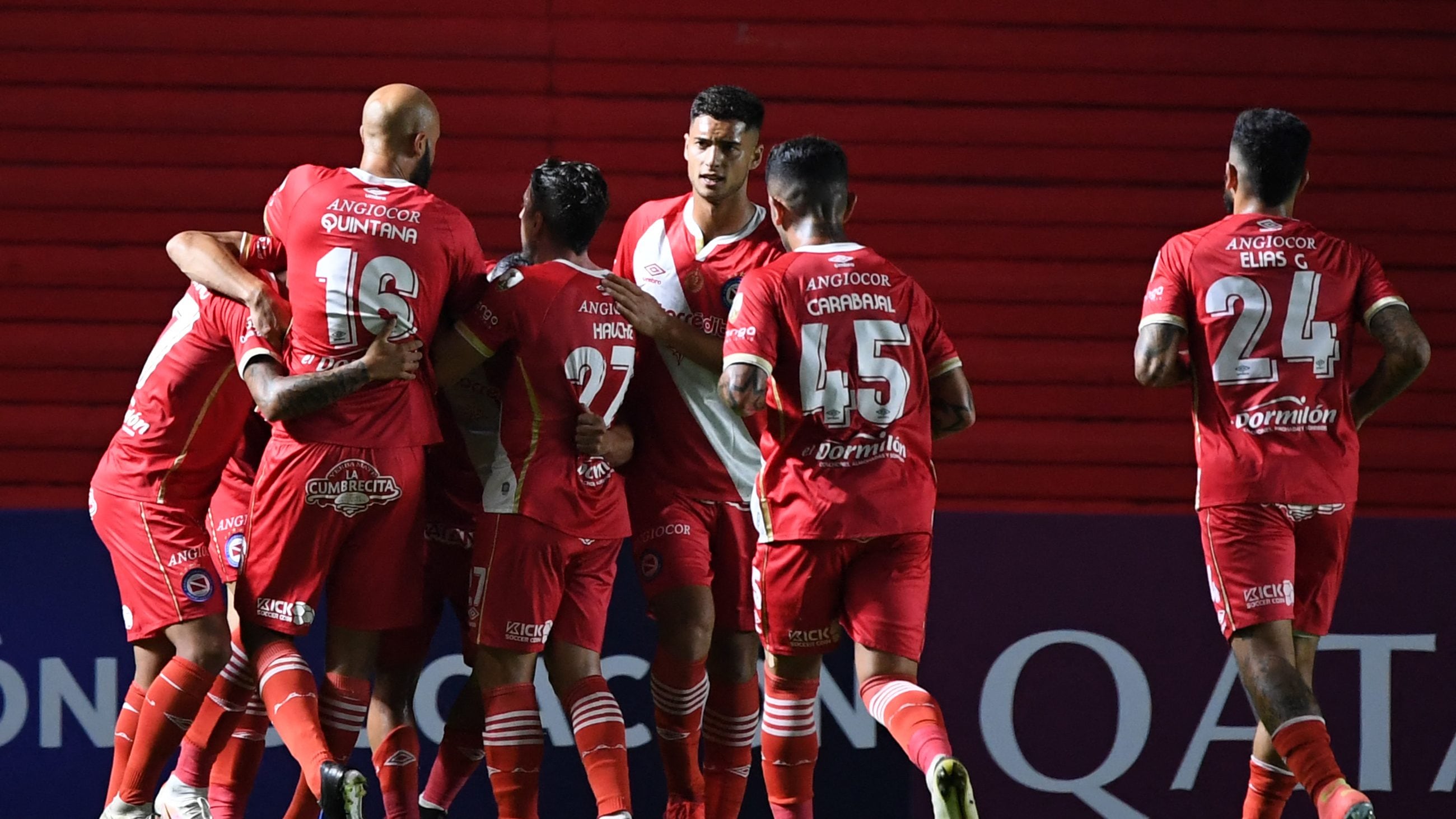 Argentina's Argentinos Juniors players celebrate a goal against Uruguay's Nacional during the Copa Libertadores football tournament group stage match at the Diego Armando Maradona stadium in Buenos Aires, on April 20, 2021. (Photo by RONALDO SCHEMIDT / AFP) (Photo by RONALDO SCHEMIDT/AFP via Getty Images)