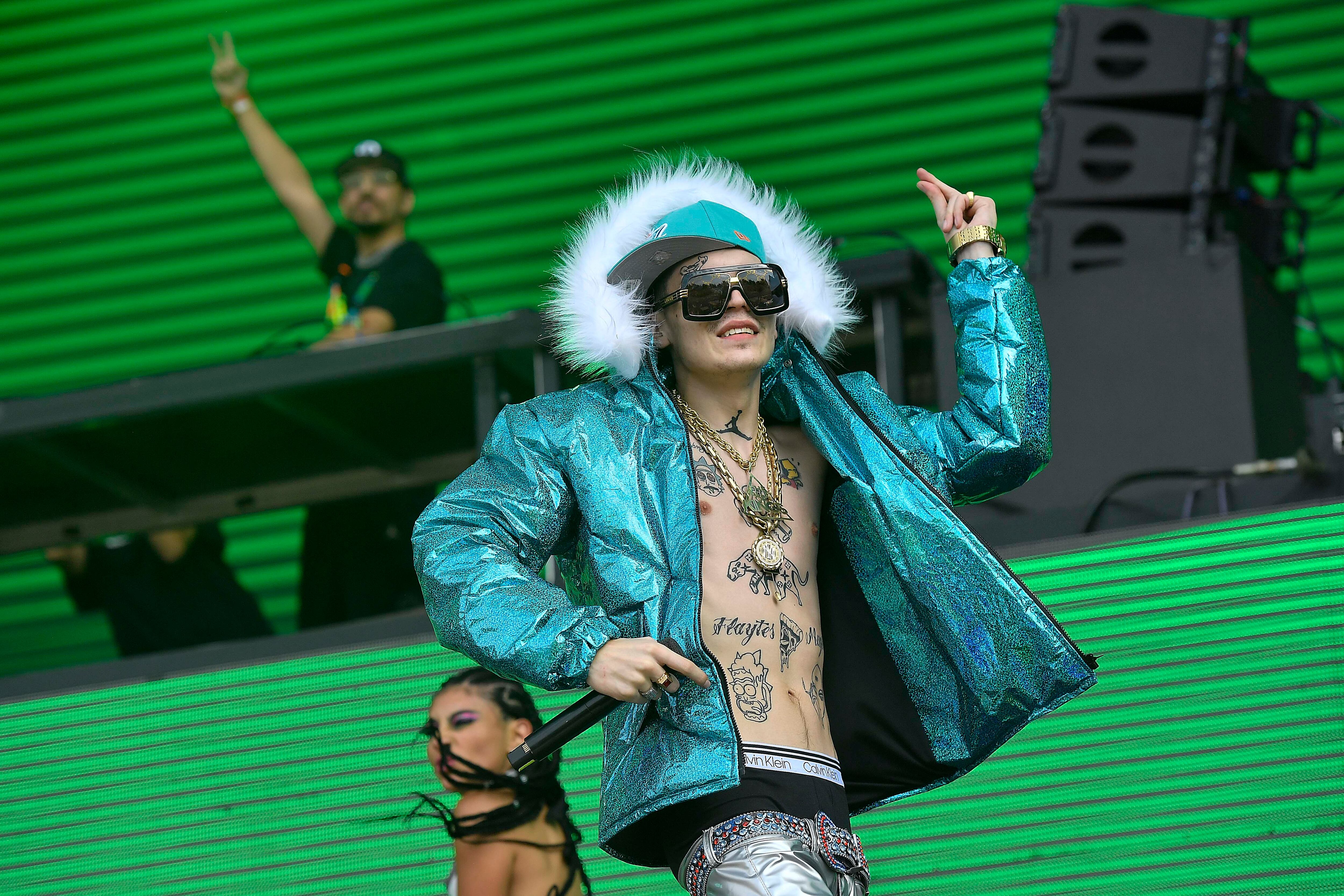 Marcianeke se presenta en el escenario Perry's durante la realizacin del Festival Lollapalooza Chile 2022 en Santiago, Chile, Marzo 20, 2022.
Matias Delacroix / LollapaloozaCL
Marcianeke performs during the third day of Lollapalooza Chile 2022 at Cerrillos Park in Santiago, Chile, March 20, 2022.
Matias Delacroix / LollapaloozaCL
