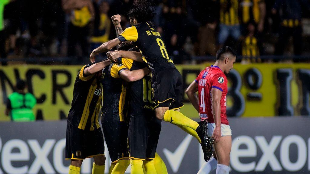 Uruguay's Penarol players celebrate after scoring a goal against Bolivia's Wilstermann during their Copa Libertadores football match at Campeon del Siglo stadium, in Montevideo, on March 11, 2020. (Photo by Dante Fernandez / AFP) (Photo by DANTE FERNANDEZ/AFP via Getty Images)
