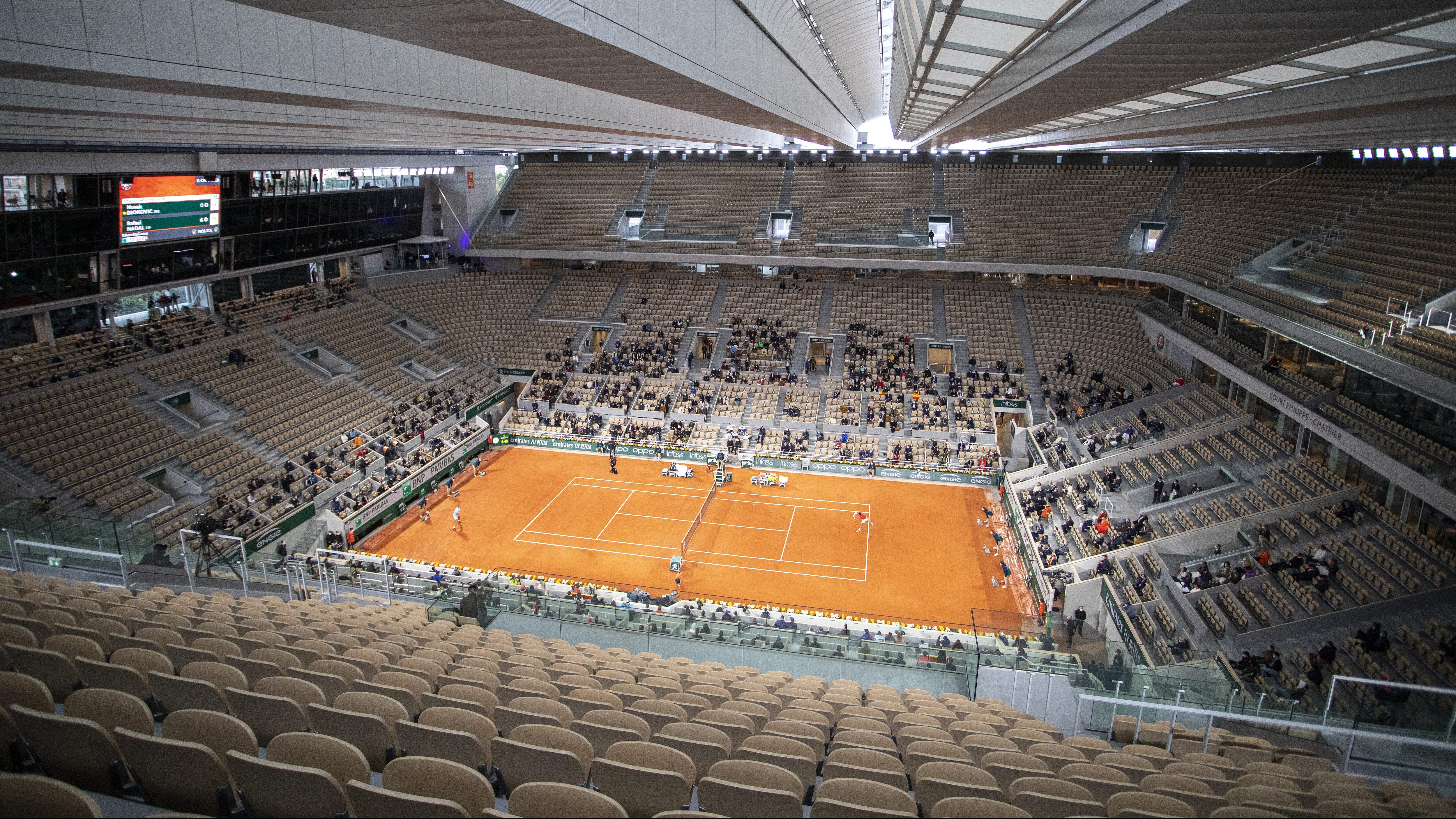 PARIS, FRANCE October 11. A general view of Rafael Nadal of Spain in action against Novak Djokovic of Serbia in the Men's Singles Final on Court Philippe-Chatrier with the roof closed during the French Open Tennis Tournament at Roland Garros on October 11th 2020 in Paris, France. (Photo by Tim Clayton/Corbis via Getty Images)