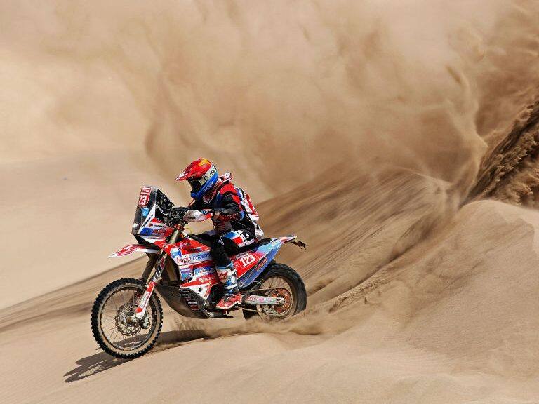 AREQUIPA, PERU - JANUARY 13:  Sjors Van Hertum No. 123 Motorbike ridden by Mark Tielemans of The Netherlands competes in the desert on the sand during Stage Six of the 2019 Dakar Rally between Arequipa and San Juan de Marcona on January 13, 2019 near Arequipa, Peru.  (Photo by Dean Mouhtaropoulos/Getty Images)