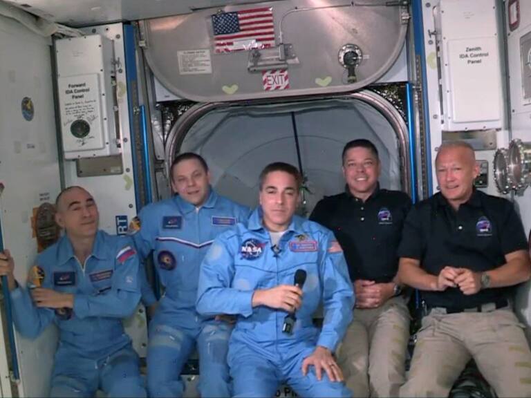 INTERNATIONAL SPACE STATION - MAY 31: In this screen grab from NASA's feed, NASA astronauts Doug Hurley (R) and Bob Behnken (2R) join NASA astronaut Chris Cassidy (C) and Russian cosmonauts, Anatoly Ivanishin (L) and Ivan Vagner (2L) aboard the International Space Station after successfully docking SpaceX's Dragon capsule May 31, 2020. The docking occurred just 19 hours after a SpaceX Falcon 9 rocket blasted off Saturday afternoon from Kennedy Space Center, the nation’s first astronaut launch to orbit from home soil in nearly a decade. (Photo by NASA via Getty Images)