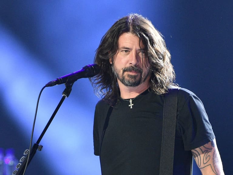 Dave Grohl of the Foo Fighters performs onstage during the taping of the &quot;Vax Live&quot; fundraising concert at SoFi Stadium in Inglewood, California, on May 2, 2021. - The fundraising concert &quot;Vax Live: The Concert To Reunite The World&quot;, put on by international advocacy organization Global Citizen, is pushing businesses to &quot;donate dollars for doses,&quot; and for G7 governments to share excess vaccines. The concert will be pre-taped on May 2 in Los Angeles, and will stream on YouTube along with American television networks ABC and CBS on May 8. (Photo by VALERIE MACON / AFP) (Photo by VALERIE MACON/AFP via Getty Images)