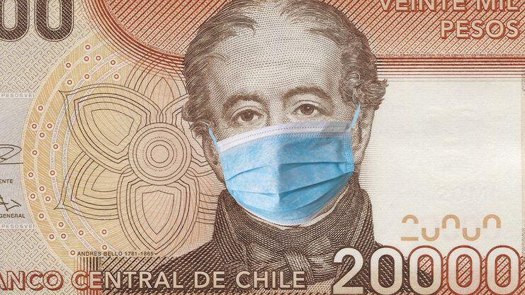 Covid-19. Chlie  quarantine, 20000 pesos banknote with medical mask. The concept of epidemic and protection against coronavrius.