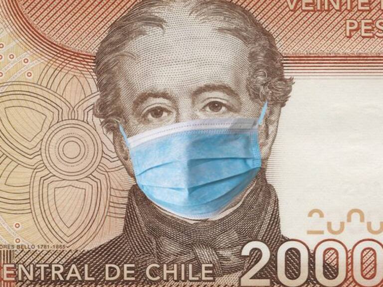 Covid-19. Chlie  quarantine, 20000 pesos banknote with medical mask. The concept of epidemic and protection against coronavrius.