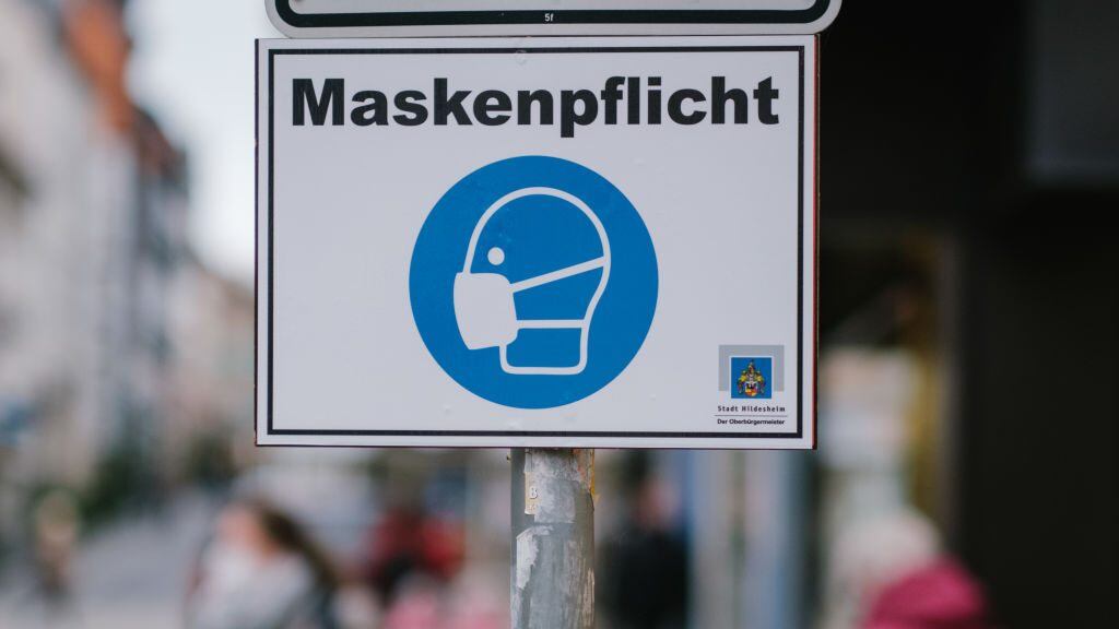 07 December 2020, Lower Saxony, Hildesheim: There's a sign downtown that says "masked duty." Photo: Ole Spata/dpa (Photo by Ole Spata/picture alliance via Getty Images)