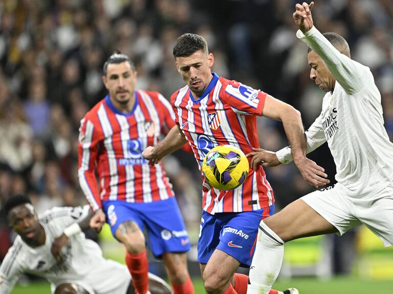 Real Madrid se mantiene en la cima de La Liga Española tras contener a un combativo Atlético de Madrid