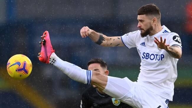 Leeds United's Polish midfielder Mateusz Klich controls the ball during the English Premier League football match between Leeds United and Burnley at Elland Road in Leeds, northern England on December 27, 2020. (Photo by Laurence Griffiths / POOL / AFP) / RESTRICTED TO EDITORIAL USE. No use with unauthorized audio, video, data, fixture lists, club/league logos or 'live' services. Online in-match use limited to 120 images. An additional 40 images may be used in extra time. No video emulation. Social media in-match use limited to 120 images. An additional 40 images may be used in extra time. No use in betting publications, games or single club/league/player publications. / (Photo by LAURENCE GRIFFITHS/POOL/AFP via Getty Images)