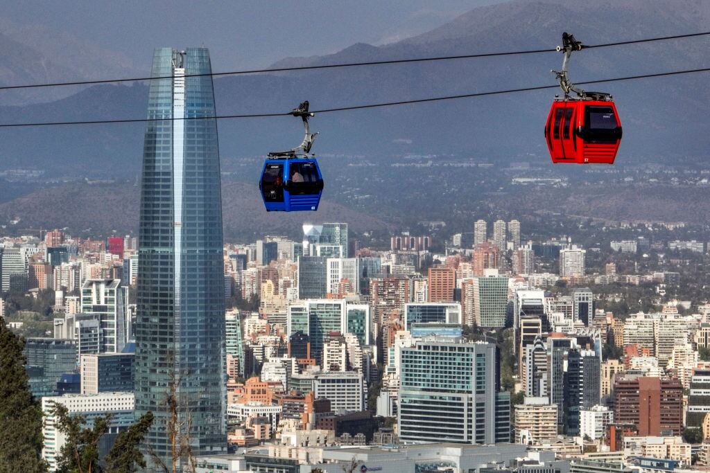 Aerial view of the metropolitan cable car next to the Costanera Center in Santiago, on February 13, 2022 (Photo by JAVIER TORRES / AFP) (Photo by JAVIER TORRES/AFP via Getty Images)