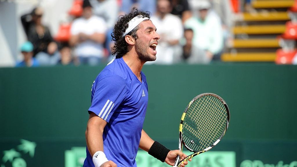Chilean tennis player Gonzalo Lama celebrates a point over Venezuela's Ricardo Rodriguez during their Davis Cup match in Santiago on September 18, 2015. AFP PHOTO/VLADIMIR RODAS (Photo credit should read VLADIMIR RODAS/AFP via Getty Images)