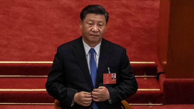 BEIJING, CHINA - MAY 28: Chinese president Xi Jinping listens during the closing session of the National People's Congress, which included a vote on a new draft security bill for Hong Kong, at the Great Hall of the People on May 28, 2020 in Beijing, China. The Chinese government passed the draft by a vote of 2,878 votes to one during the session. The draft law, which has drawn international concern, is set to address issues such as secession, subversion, terrorism, and foreign interference, comes after a year of anti-government protests in the semi-autonomous region. China held its annual parliamentary gathering, known as 'The Two Sessions', at the Great Hall of the People from May 21-28th after being postponed at the height of the coronavirus outbreak in China earlier this year. (Photo by Kevin Frayer/Getty Images)