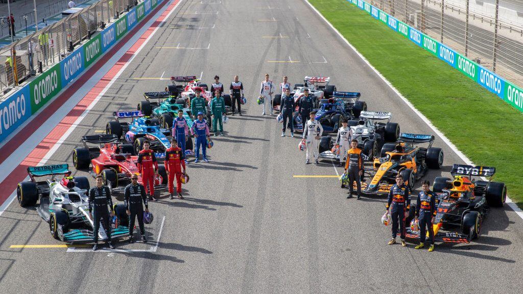 BAHRAIN, BAHRAIN - MARCH 10: (EDITORS NOTE: Image has been digitally retouched) The F1 drivers pose for a photo on the grid with their cars during Day One of F1 Testing at Bahrain International Circuit on March 10, 2022 in Bahrain, Bahrain. (Photo by Dan Istitene - Formula 1/Formula 1 via Getty Images)