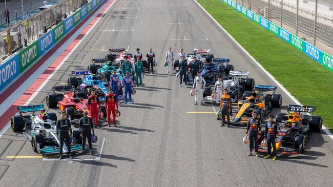 BAHRAIN, BAHRAIN - MARCH 10: (EDITORS NOTE: Image has been digitally retouched) The F1 drivers pose for a photo on the grid with their cars during Day One of F1 Testing at Bahrain International Circuit on March 10, 2022 in Bahrain, Bahrain. (Photo by Dan Istitene - Formula 1/Formula 1 via Getty Images)