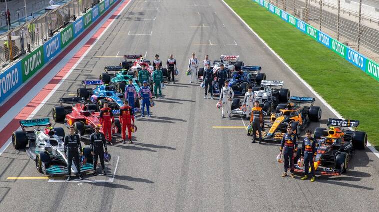 BAHRAIN, BAHRAIN - MARCH 10: (EDITORS NOTE: Image has been digitally retouched) The F1 drivers pose for a photo on the grid with their cars during Day One of F1 Testing at Bahrain International Circuit on March 10, 2022 in Bahrain, Bahrain. (Photo by Dan Istitene - Formula 1/Formula 1 via Getty Images)