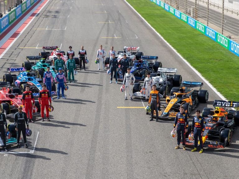 BAHRAIN, BAHRAIN - MARCH 10: (EDITORS NOTE: Image has been digitally retouched) The F1 drivers pose for a photo on the grid with their cars during Day One of F1 Testing at Bahrain International Circuit on March 10, 2022 in Bahrain, Bahrain. (Photo by Dan Istitene - Formula 1/Formula 1 via Getty Images)