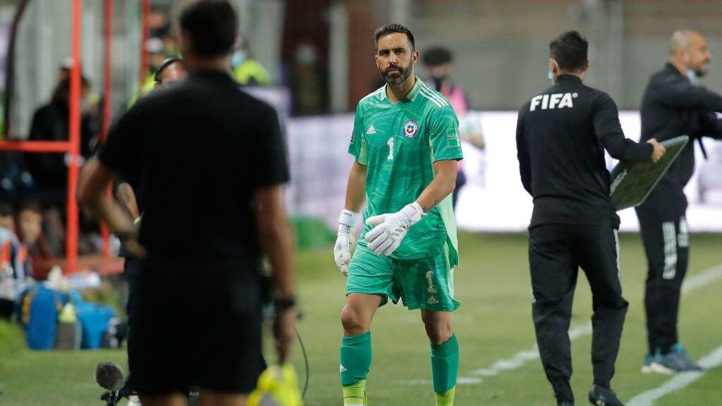 Chile's goalkeeper Claudio Bravo leaves the field after an injury during the South American qualification football match for the FIFA World Cup Qatar 2022 against Argentina at Zorros del Desierto Stadium in Calama, Chile on January 27, 2022. (Photo by Javier Torres / various sources / AFP) (Photo by JAVIER TORRES/AFP via Getty Images)
