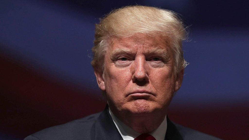 VIRGINIA BEACH, VA - SEPTEMBER 06:  Republican presidential nominee Donald Trump pauses during a campaign event September 6, 2016 in Virginia Beach, Virginia. Trump participated in a discussion with retired Army Lieutenant General Michael Flynn.  (Photo by Alex Wong/Getty Images)