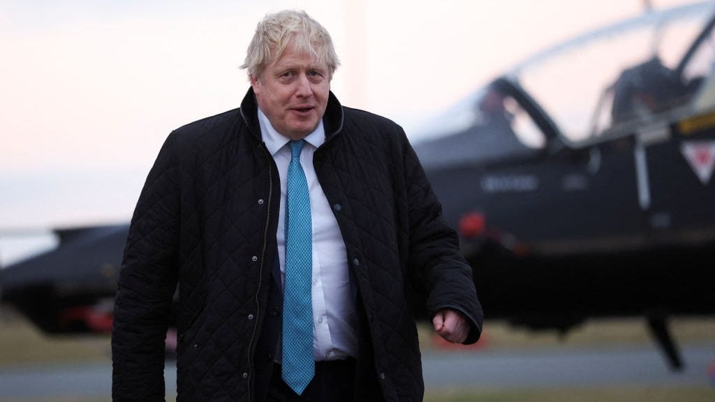 HOLYHEAD, UNITED KINGDOM - JANUARY 27: Prime Minister Boris Johnson visits RAF Valley in Holyhead on January 27, 2022 in Anglesey, North Wales. The findings from Sue Gray's inquiry into several alleged lockdown rule-breaking parties at Downing Street, during the time when strict Covid-19 restrictions were in place, are expected to be published this week while Metropolitan Police announced on Tuesday it's conducting its own investigation into the alleged events. (Photo by Carl Recine - WPA Pool/Getty Images)