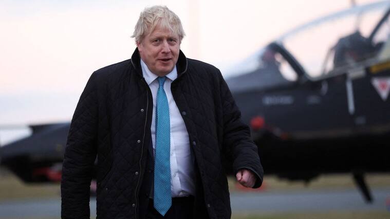 HOLYHEAD, UNITED KINGDOM - JANUARY 27: Prime Minister Boris Johnson visits RAF Valley in Holyhead on January 27, 2022 in Anglesey, North Wales. The findings from Sue Gray's inquiry into several alleged lockdown rule-breaking parties at Downing Street, during the time when strict Covid-19 restrictions were in place, are expected to be published this week while Metropolitan Police announced on Tuesday it's conducting its own investigation into the alleged events. (Photo by Carl Recine - WPA Pool/Getty Images)