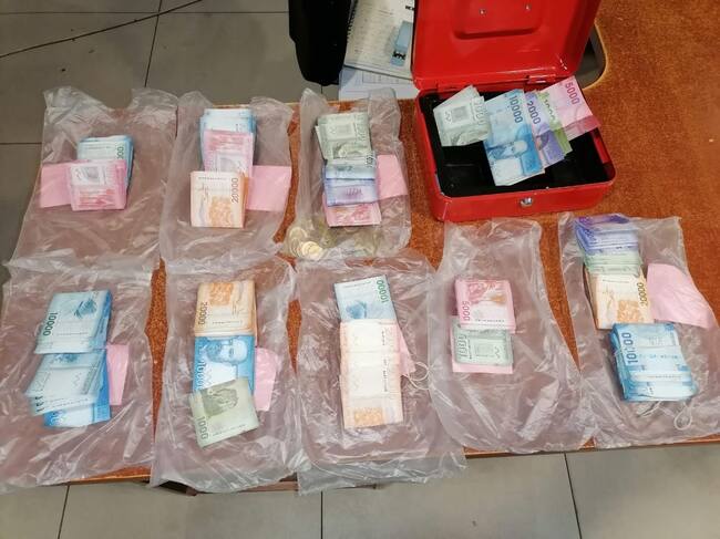 El dinero incautado en el casino clandestino. Foto: Carabineros