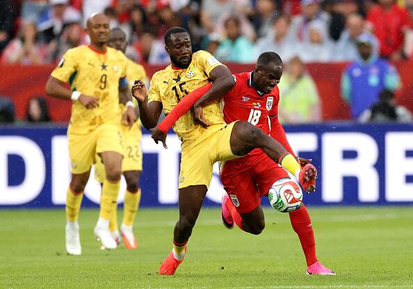TORONTO, ONTARIO - JUNE 17: Cecilio Waterman #18 of Panama and Elisha Owusu #15 of Ghana compete for the ball during the FIFA World Cup 2026 Group L match between Ghana and Panama at Toronto Stadium on June 17, 2026 in Toronto, Ontario. (Photo by Darrian Traynor/Getty Images)