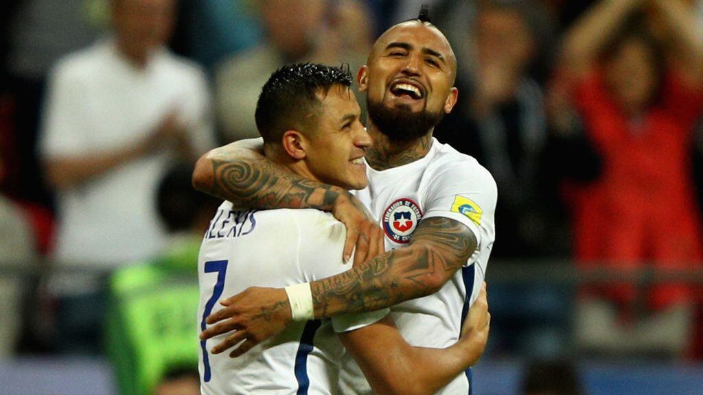 KAZAN, RUSSIA - JUNE 28:  Alexis Sanchez of Chile celebrates scoring his sides third penalty with Arturo Vidal of Chile during the FIFA Confederations Cup Russia 2017 Semi-Final between Portugal and Chile at Kazan Arena on June 28, 2017 in Kazan, Russia.  (Photo by Ian Walton/Getty Images)