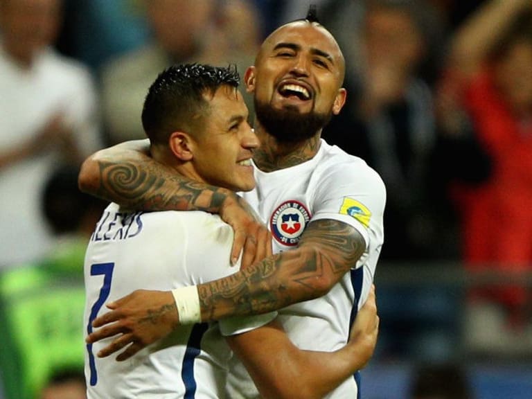 KAZAN, RUSSIA - JUNE 28: Alexis Sanchez of Chile celebrates scoring his sides third penalty with Arturo Vidal of Chile during the FIFA Confederations Cup Russia 2017 Semi-Final between Portugal and Chile at Kazan Arena on June 28, 2017 in Kazan, Russia. (Photo by Ian Walton/Getty Images)