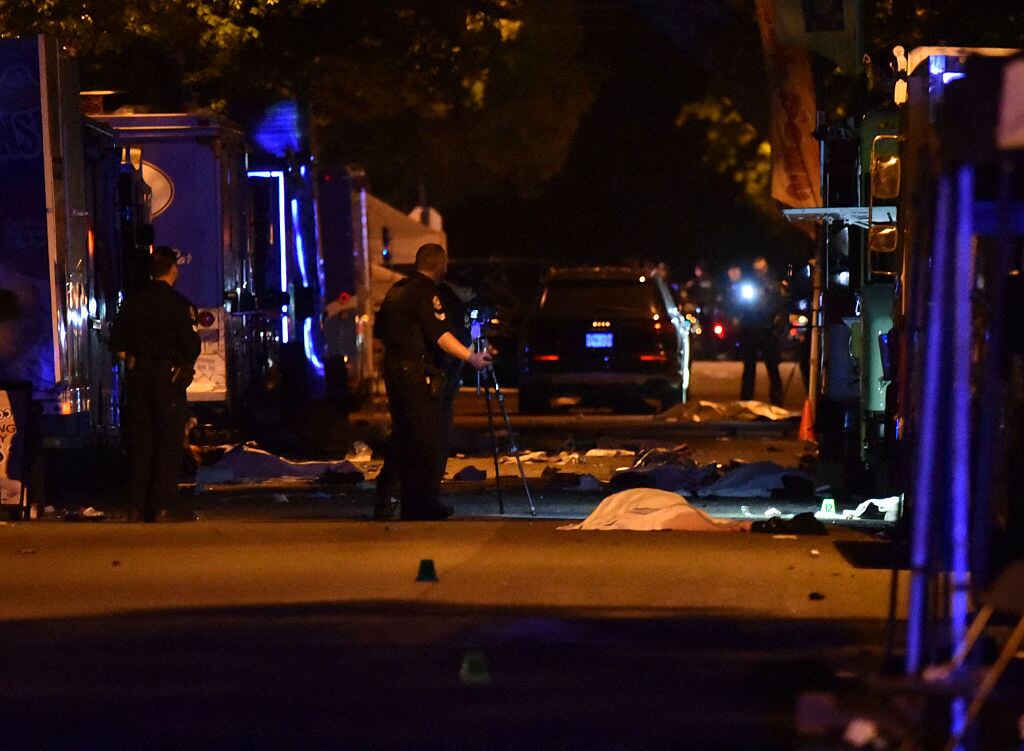 Vancouver police investigate a crime scene after a man drove into pedestrians at the annual Lapu Lapu festival celebrating Filipino culture, at East 43rd Avenue and Fraser, in the south of Vancouver on April 26, 2025. Canadian police arrested a man on April 26 after a car plowed into a street party in the western city of Vancouver killing a number of people. Authorities said the incident happened shortly after 8:00 pm (0300 GMT Sunday) in Vancouver's Sunset on Fraser neighborhood as members of the Filipino community gathered to celebrate Lapu Lapu Day. (Photo by Don MacKinnon / AFP) (Photo by DON MACKINNON/AFP via Getty Images)