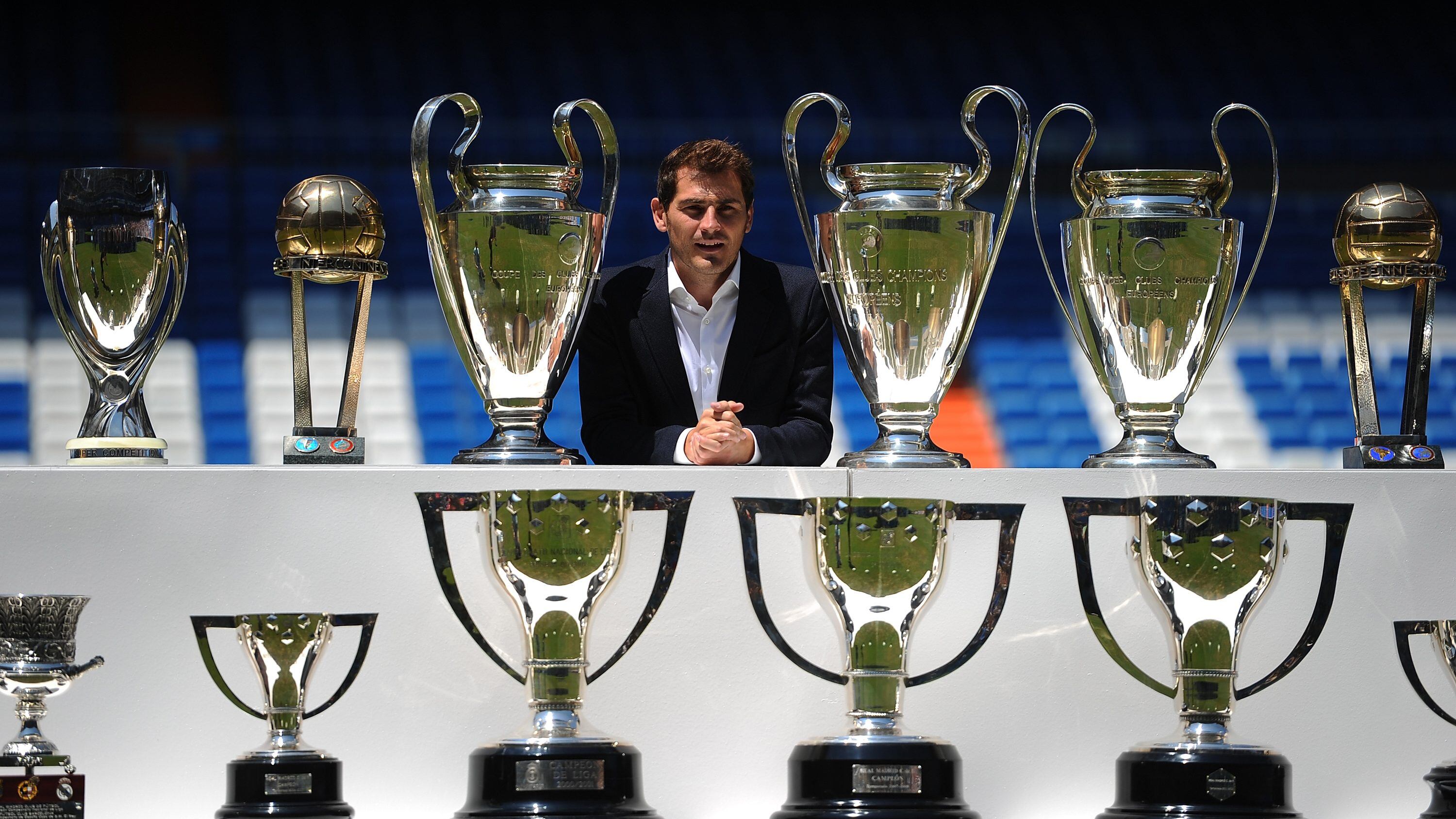 MADRID, SPAIN - JULY 13:  Iker Casillas poses behind trophies he has won during his career in Real Madrid after holding a press conference with Real  president Florentino Perez at the Santiago Bernabeu stadium to announce that he will be leaving Real Madrid football team on July 13, 2015 in Madrid, Spain.  (Photo by Denis Doyle/Getty Images)