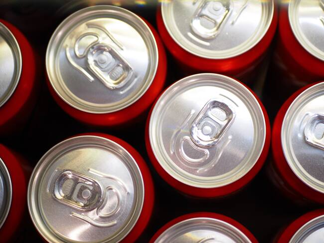 Cans of soft drink lined up