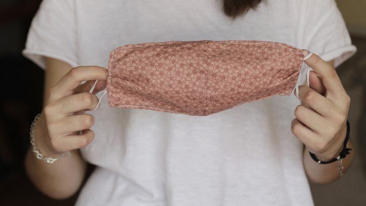 Woman Holding Homemade Face Mask