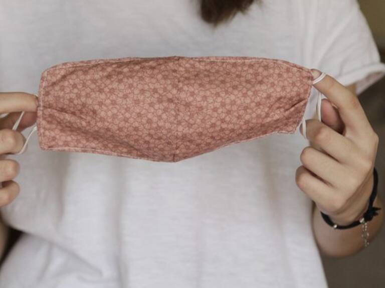 Woman Holding Homemade Face Mask