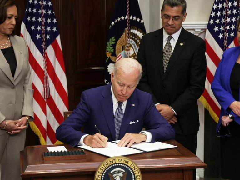 WASHINGTON, DC - JULY 08: U.S. President Joe Biden signs an executive order on access to reproductive health care services as (L-R) Vice President Kamala Harris, Secretary of Health and Human Services Xavier Becerra, and Deputy Attorney General Lisa Monaco look on during an event at the Roosevelt Room of the White House on July 8, 2022 in Washington, DC. President Biden delivered remarks on reproductive rights at the event. (Photo by Alex Wong/Getty Images)
