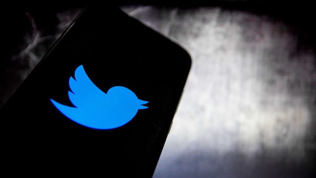 In this photo illustration Twitter logo is displayed on a smartphone screen in Athens, Greece on December 14, 2020. (Photo by Nikolas Kokovlis/NurPhoto via Getty Images)