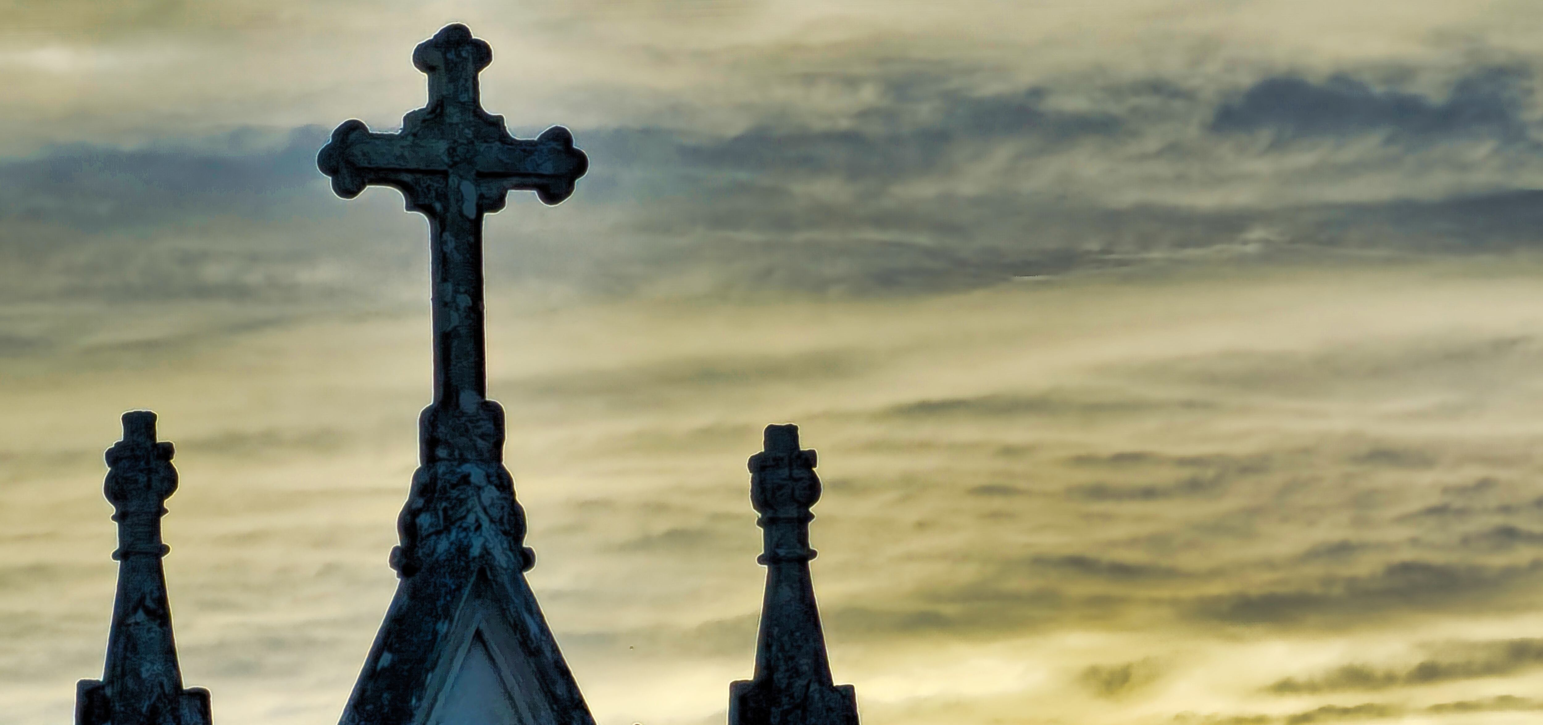 Sunset in cemetery.