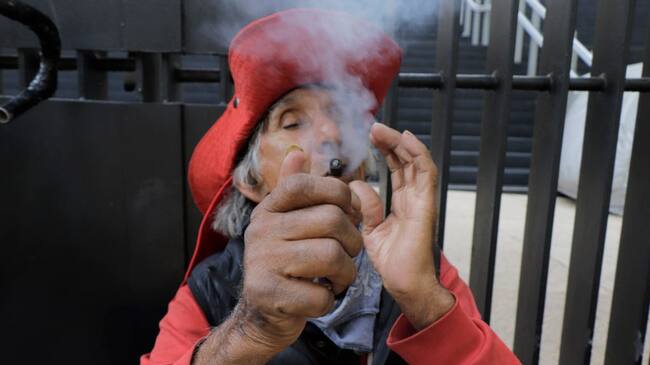 An elderly man smokes marijuana outside the Senate of the Republic in Mexico City during the Weed Day and the different movements that promote the legalization of this plant worldwide, where they demanded to guarantee its legitimate use, no to the persecution of people for possession, self-cultivation, dignified treatment and consumption spaces. (Photo by Gerardo Vieyra/NurPhoto via Getty Images)