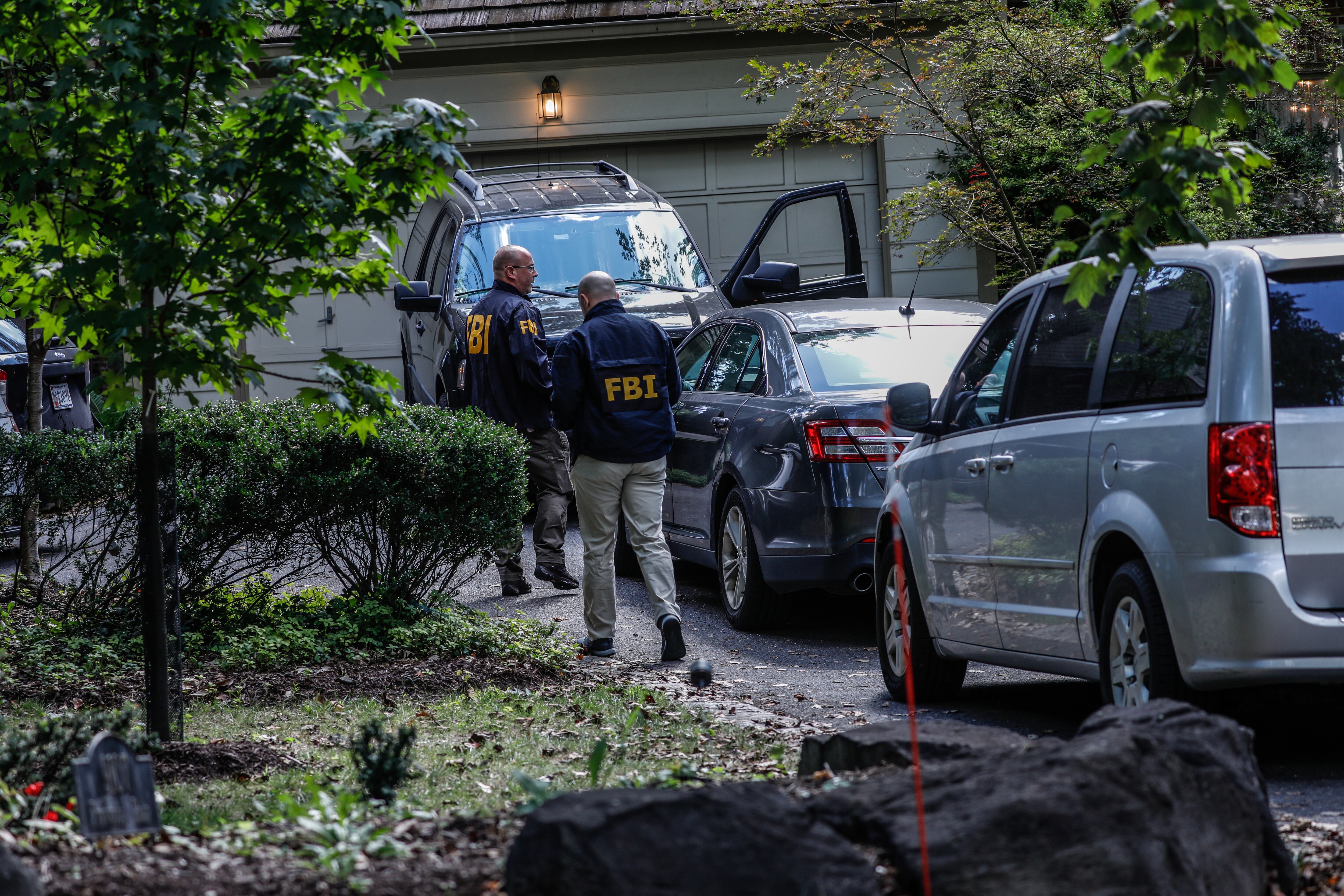 BETHESDA, MARYLAND, US - AUGUST 22: FBI agents raid the home of former US National Security Adviser John Bolton as part of a national security investigation in Bethesda, Maryland, United States on August 22, 2025. (Photo by Yasin Ozturk/Anadolu via Getty Images)