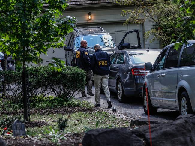 BETHESDA, MARYLAND, US - AUGUST 22: FBI agents raid the home of former US National Security Adviser John Bolton as part of a national security investigation in Bethesda, Maryland, United States on August 22, 2025. (Photo by Yasin Ozturk/Anadolu via Getty Images)