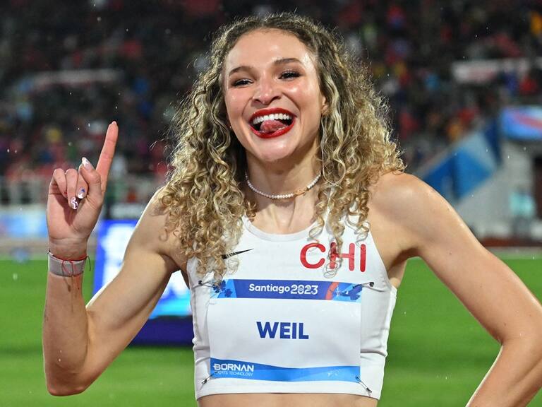 Chile's Martina Weil celebrates after winning the gold medal in the women's 400m final of the Pan American Games Santiago 2023 at the National Stadium in Santiago, on November 1st, 2023. (Photo by MARTIN BERNETTI / AFP) (Photo by MARTIN BERNETTI/AFP via Getty Images)
