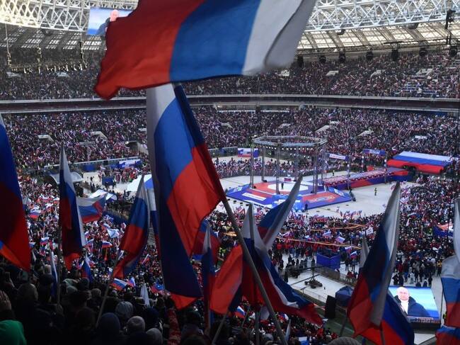 Photo by Kremlin Press Office / Handout/Anadolu Agency via Getty Images
