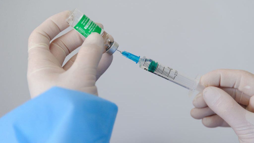 LVIV, UKRAINE - 2021/03/18: A health worker prepares a doze of AstraZeneca (Covishield) vaccine at the hospital.The Ministry of Health of Ukraine has publicly vaccinated health workers first with the drug AstraZeneca (Covishield) vaccine against COVID-19. From March 19, a lockdown is to be introduced in Lviv until March 28. The need for strict quarantine is due to the rapid increase of the number of patients with Covid-19. (Photo by Mykola Tys/SOPA Images/LightRocket via Getty Images)