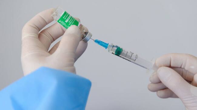 LVIV, UKRAINE - 2021/03/18: A health worker prepares a doze of AstraZeneca (Covishield) vaccine at the hospital.The Ministry of Health of Ukraine has publicly vaccinated health workers first with the drug AstraZeneca (Covishield) vaccine against COVID-19. From March 19, a lockdown is to be introduced in Lviv until March 28. The need for strict quarantine is due to the rapid increase of the number of patients with Covid-19. (Photo by Mykola Tys/SOPA Images/LightRocket via Getty Images)