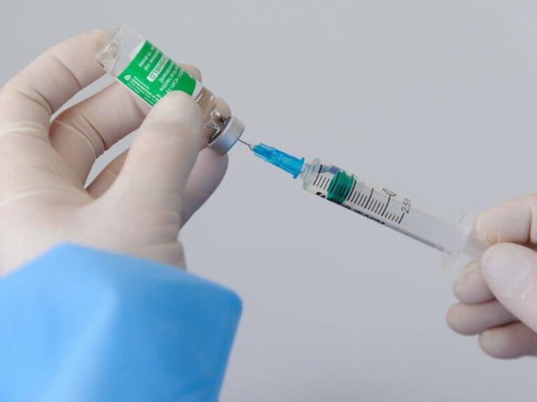 LVIV, UKRAINE - 2021/03/18: A health worker prepares a doze of AstraZeneca (Covishield) vaccine at the hospital.The Ministry of Health of Ukraine has publicly vaccinated health workers first with the drug AstraZeneca (Covishield) vaccine against COVID-19. From March 19, a lockdown is to be introduced in Lviv until March 28. The need for strict quarantine is due to the rapid increase of the number of patients with Covid-19. (Photo by Mykola Tys/SOPA Images/LightRocket via Getty Images)