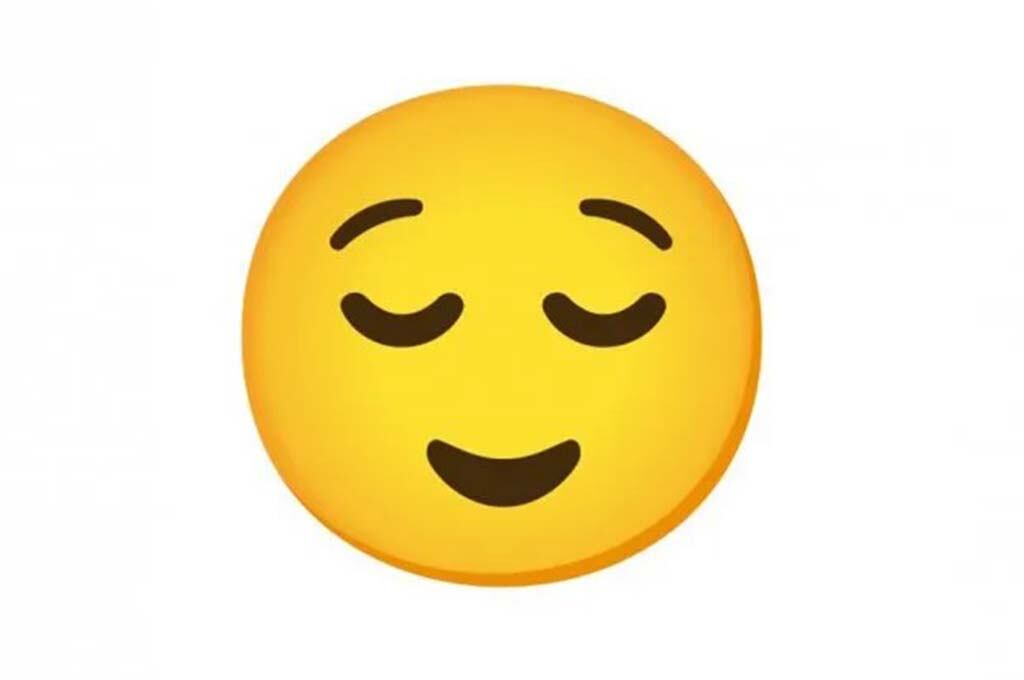 Emoji de cara de alivio en WhatsApp