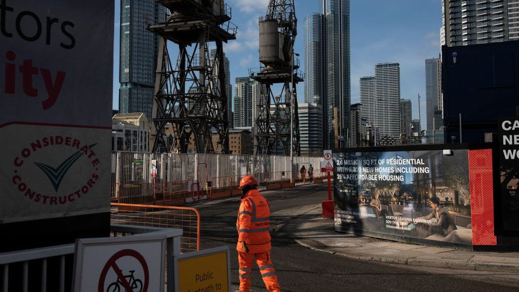 LONDON, ENGLAND - FEBRUARY 12: New housing development near the Canary Wharf business district on the Isle of Dogs on February 12, 2021 in London, England. The ONS figures released today show that the UK Economy contracted by 9.9% in 2020, the largest fall among G7 Countries last year. (Photo by Dan Kitwood/Getty Images)