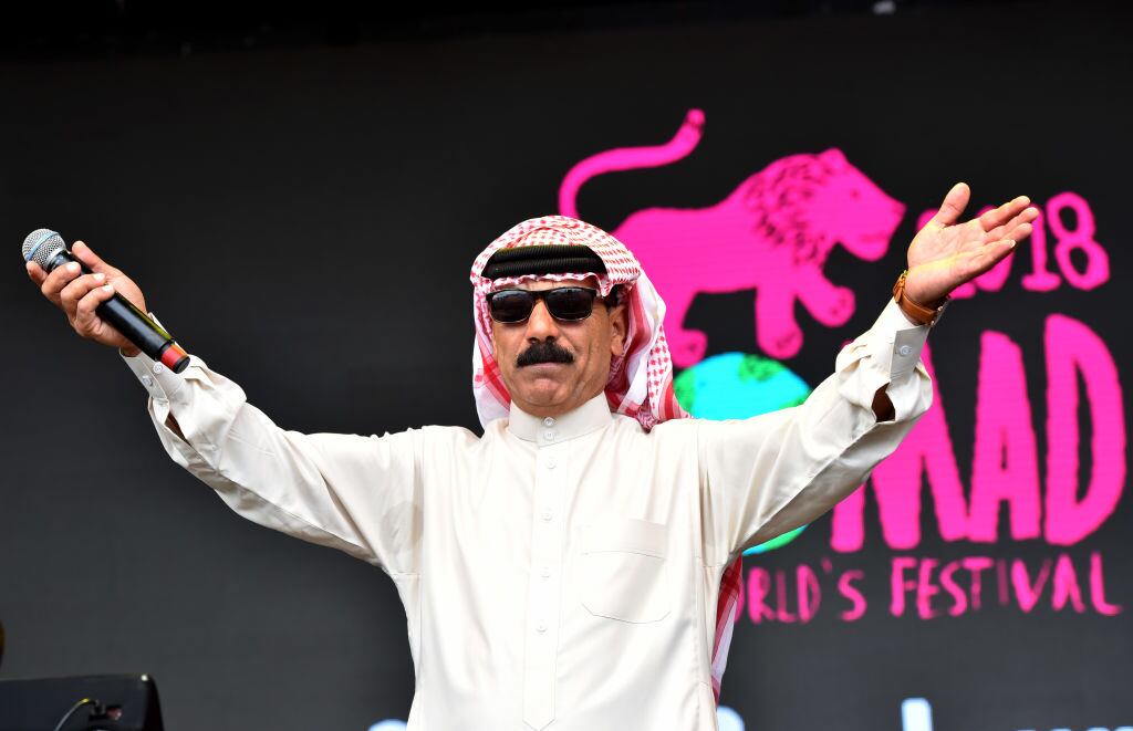 MALMESBURY, ENGLAND - JULY 27:  Omar Souleyman performs on stage during Day 2 of the Womad Festival 2018 at Charlton Park on July 27, 2018 near Malmesbury, Wiltshire, England.  (Photo by C Brandon/Redferns)
