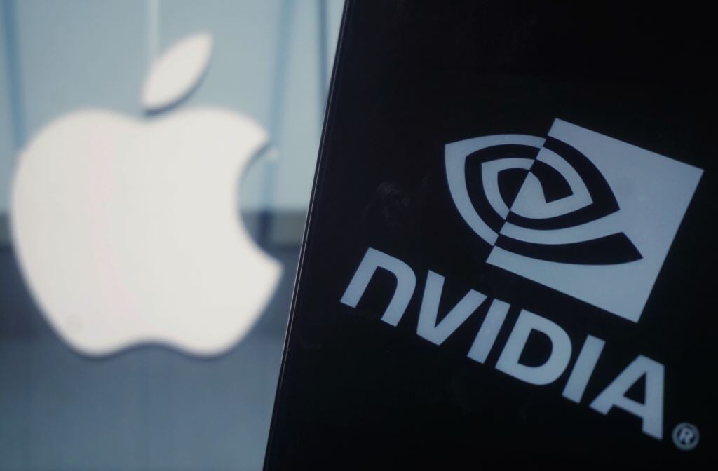 HANGZHOU, CHINA - JUNE 3, 2024 - The NVIDIA logo and the Apple logo are pictured in Hangzhou city, Zhejiang province, China, June 6, 2024. On June 5, Eastern time, Nvidia's stock market value exceeded $3 trillion, officially surpassing Apple's market value and becoming the world's second largest technology giant by market value. It is worth noting that in just over 3 months, Nvidia's market value soared from $2 trillion to $3 trillion. (Photo credit should read CFOTO/Future Publishing via Getty Images)