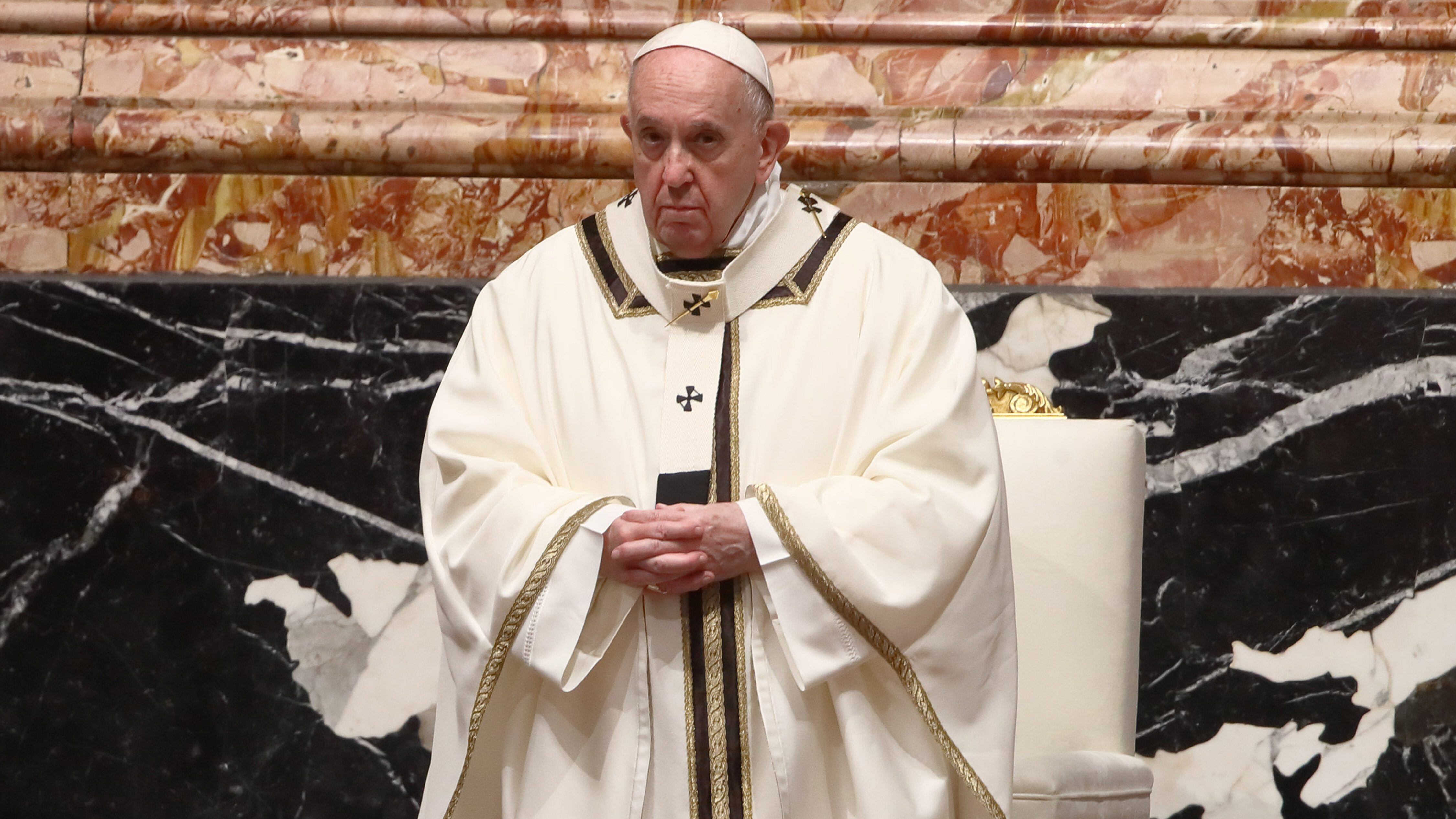 VATICAN CITY, VATICAN - DECEMBER 24: Pope Francis celebrates the Christmas Eve Mass in St. Peter's Basilica on December 24, 2020 in Vatican City, Vatican. With Italy under a new lockdown for the holidays, Pope Francis celebrated the Christmas vigil Mass in a near empty Saint Peter’s Basilica at an earlier time than usual, in order to adhere to Italian curfew rules. (Photo by Vatican Pool/Getty Images)
