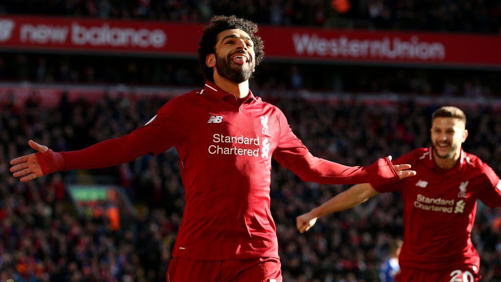 LIVERPOOL, ENGLAND - OCTOBER 27: Mohamed Salah of Liverpool celebrates after scoring his team's first goal during the Premier League match between Liverpool FC and Cardiff City at Anfield on October 27, 2018 in Liverpool, United Kingdom. (Photo by Jan Kruger/Getty Images)