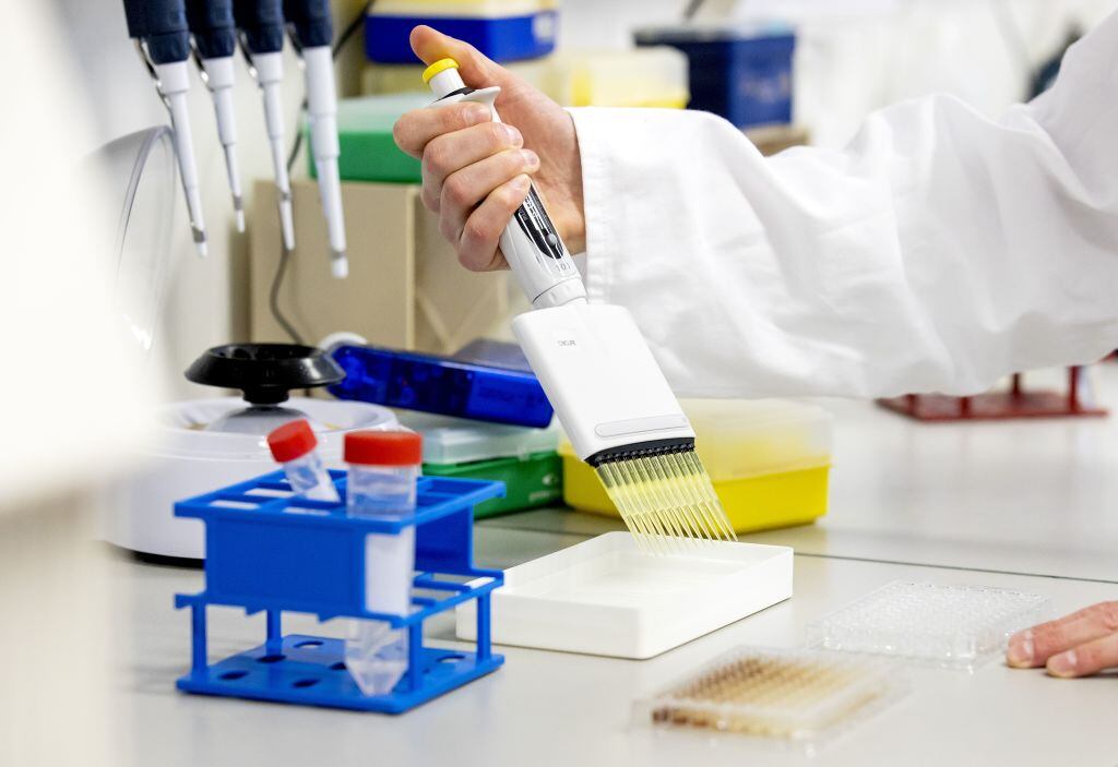A researcher works in the laboratory of the Amsterdam UMC, in Amsterdam, the Netherlands, 28 May 2020. - Griffioen's team is developing a vaccine against the COVID-19 disease caused by the novel coronavirus. (Photo by Koen Van WEEL / ANP / AFP) / Netherlands OUT (Photo by KOEN VAN WEEL/ANP/AFP via Getty Images)